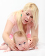 Photo: Young mother with her baby together. Young mother with her baby together.