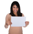 Young Woman Pointing At Placard