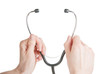 Doctor hands holding a stethoscope isolated on white