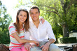 Couple in Madrid relaxing in Retiro park