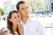Sweet couple walking in city avenue