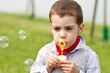 Photo: bambino che fa le bolle di sapone bambino che fa le bolle di sapone