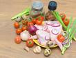 vegetables, quail eggs and raw chicken wings closeup