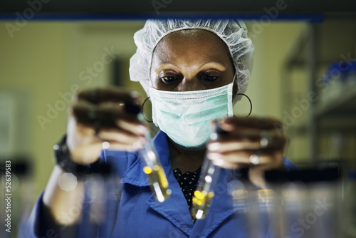 Photo: Industrial lab and staff, woman at work as scientist Industrial lab and staff, woman at work as scientist