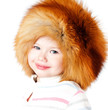 Photo: cheerful girl in a fur hat cheerful girl in a fur hat