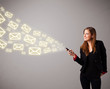 attractive young lady holding a phone with message icons
