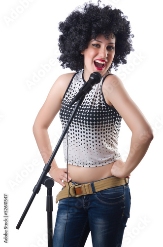 Photo: Pop star with mic on white Pop star with mic on white