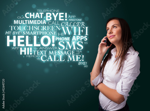 Photo: Young girl calling by phone with word cloud Young girl calling by phone with word cloud