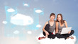 Photo: Happy girls looking at modern cloud network Happy girls looking at modern cloud network