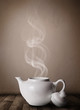 Tea pot with abstract white steam