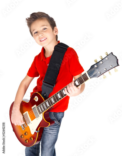 Photo: Portrait of young boy with a electric guitar Portrait of young boy with a electric guitar