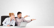 Businessman and businesswoman with plain white copy space