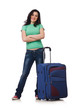 Young woman with suitcase isolated on white