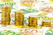 stack of money coins, falling curve