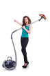 Young woman with vacuum cleaner on white