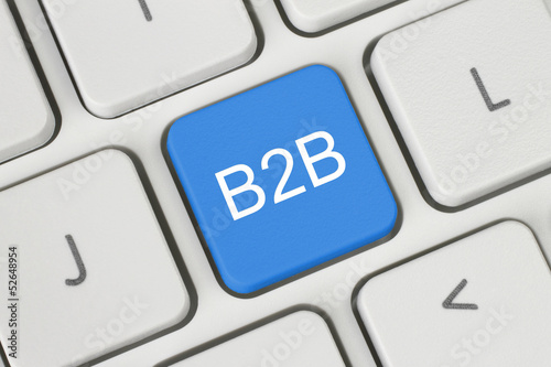 Photo: Blue B2B (business to business) button on keyboard close-up . Blue B2B (business to business) button on keyboard close-up .