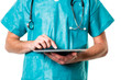 Photo: Young doctor using a tablet computer at work Young doctor using a tablet computer at work