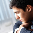 Photo: Thinking businessman at office Thinking businessman at office