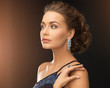 woman with diamond earrings