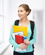 student with books and schoolbag