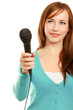 Smiling woman with microphone isolated on white background