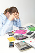Businesswoman and calculators
