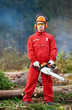 Photo: Lumberjack Worker With Chainsaw In The Forest Lumberjack Worker With Chainsaw In The Forest