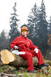 Photo: Lumberjack Worker With Chainsaw In The Forest Lumberjack Worker With Chainsaw In The Forest
