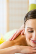 woman having a wellness back massage