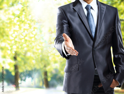 Photo: american businessman handshake gesture american businessman handshake gesture