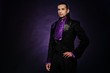 Young handsome brunette man in stage costume