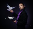 Photo: Young handsome brunette magician man Young handsome brunette magician man