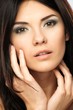 Photo: Young beautiful brunette woman with make-up Young beautiful brunette woman with make-up