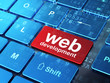 Web development concept: Web Development on computer keyboard ba