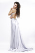Foto: Luxury. Glamorous Woman in Light Shiny Dress. Dolce Vita Luxury. Glamorous Woman in Light Shiny Dress. Dolce Vita