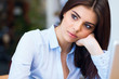 Foto: Portrait of a beautiful pensive businesswoman looking away Portrait of a beautiful pensive businesswoman looking away