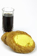 pastry cake with pudding with dark beverage,