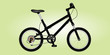 Black bicycle on light green background