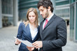Business people reading a document