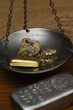 Gold Nuggets & Gold Bar on Balance Scale - Silver Ingot Beside