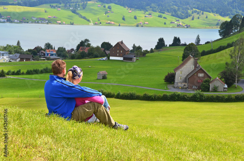 Photo: Travelers having rest on the hill Travelers having rest on the hill