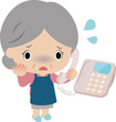電話口でうろたえる高齢の女性