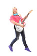 Full length portrait of a female rock star jumping and  playing