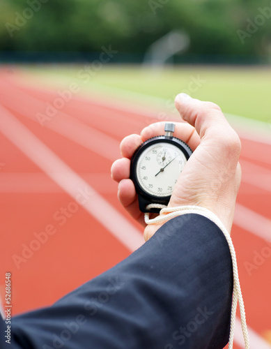 Photo: Businessman mit Stoppuhr Businessman mit Stoppuhr