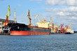 Photo: cargo ships loading in cargo terminal cargo ships loading in cargo terminal
