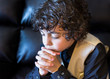 Young Latin Boy Praying