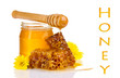 Jar of honey and honeycombs isolated on white