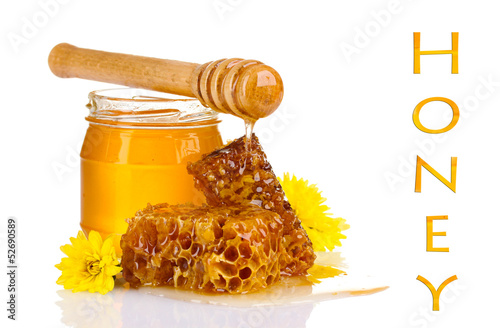 Photo: Jar of honey and honeycombs isolated on white Jar of honey and honeycombs isolated on white