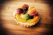 The fruit dessert on a desk