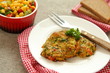 Homemade zucchini fritters with chorizo sausage and corn salsa
